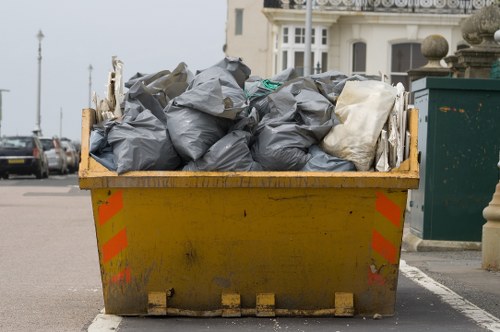 Investigators reviewing commercial waste collection records and photos